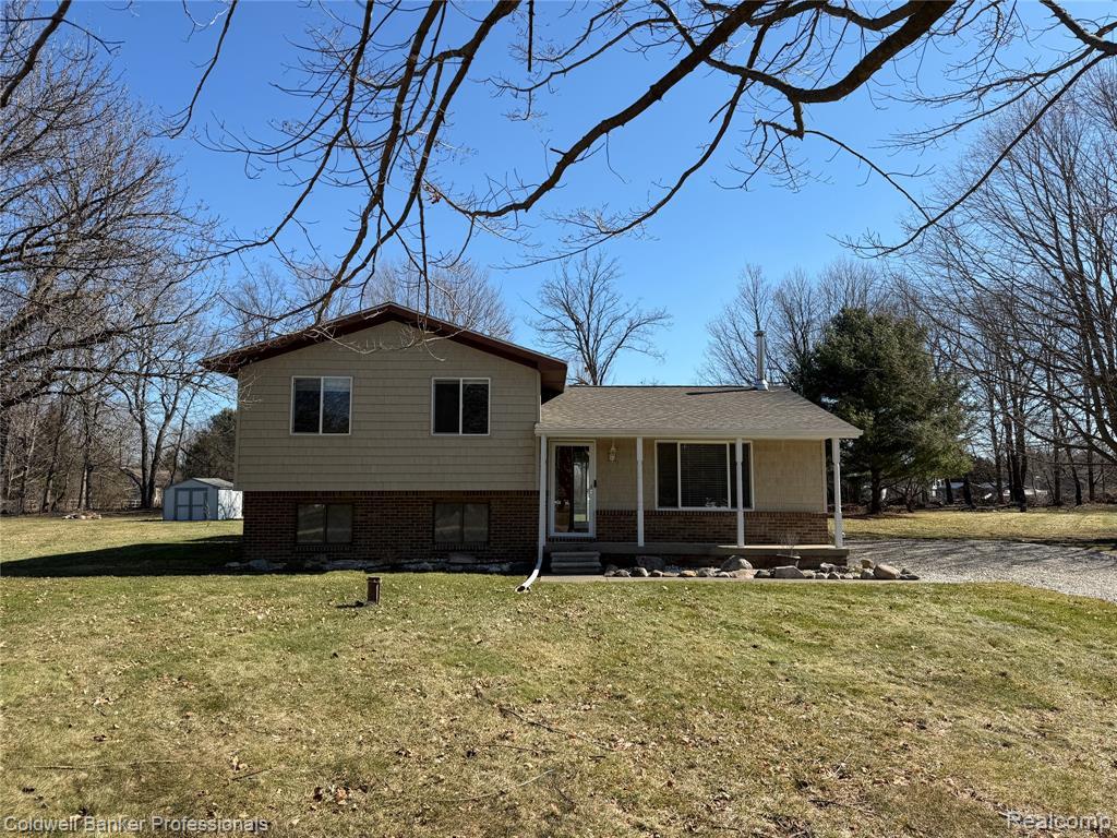 Front exterior of 152 Crooked Limb Drive in Lapeer